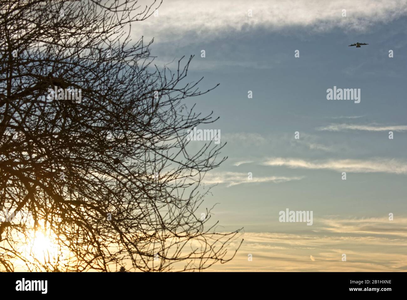 Airplane flying in Sky Stock Photo - Alamy
