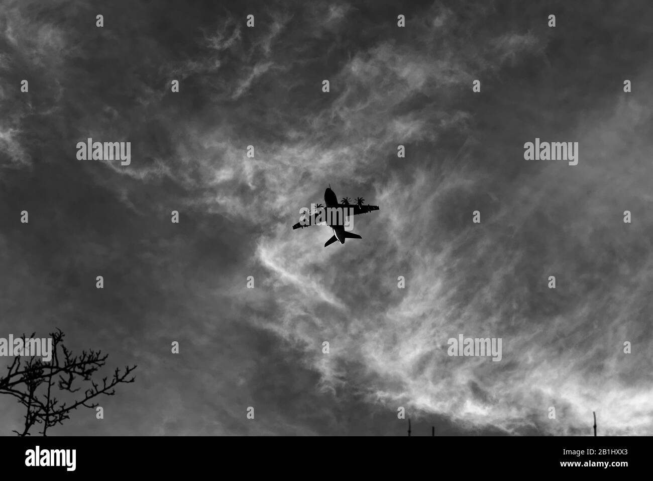 Airplane flying in Sky Stock Photo - Alamy