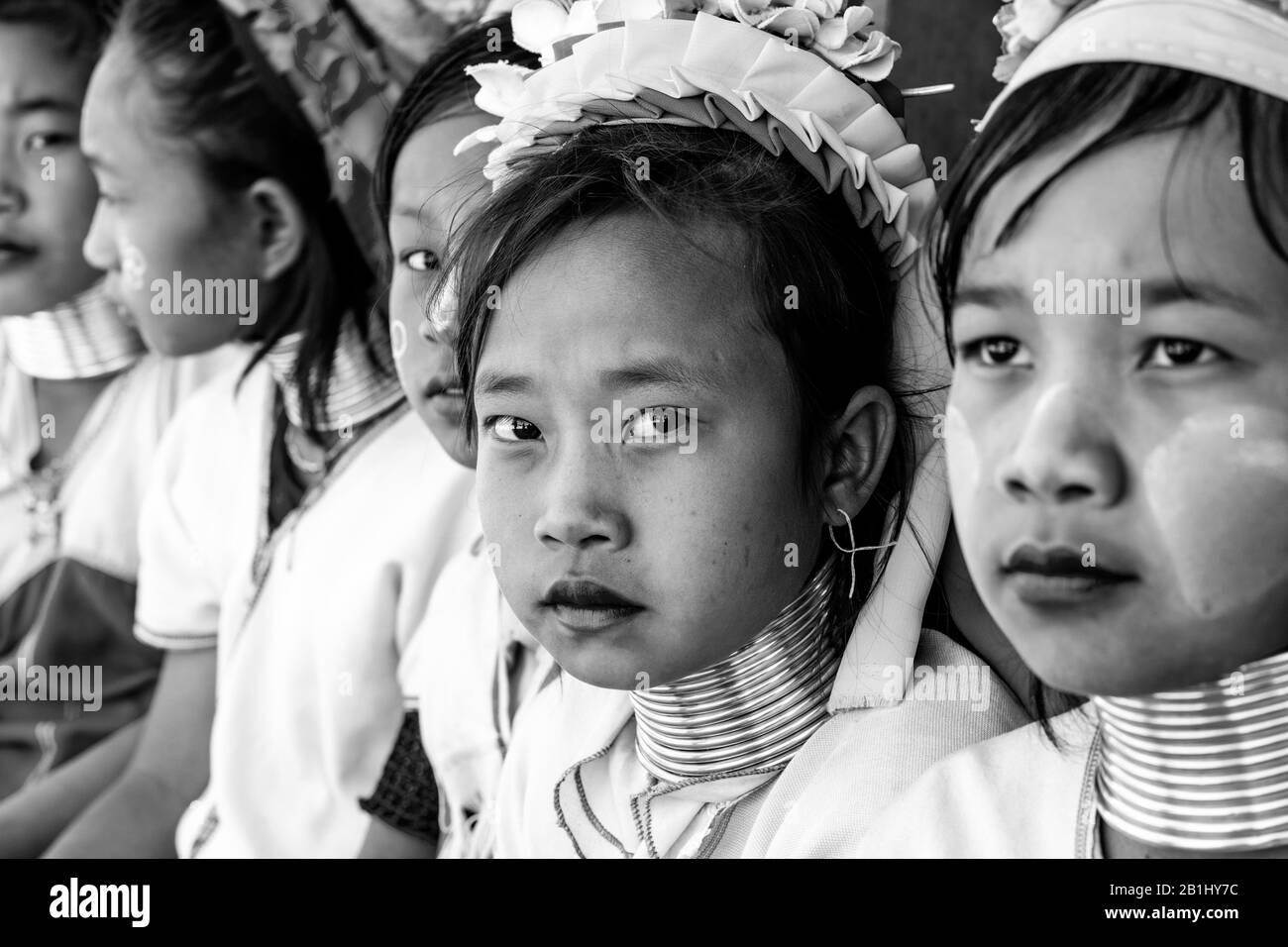 A Group Of Children From The Kayan (Long Neck) Minority Group In Traditional Costume, Pan Pet Village, Loikaw, Kayah State, Myanmar. Stock Photo