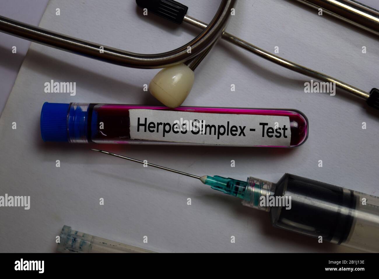 Herpes Simplex - Test with blood sample. Top view isolated on office desk. Healthcare/Medical concept Stock Photo