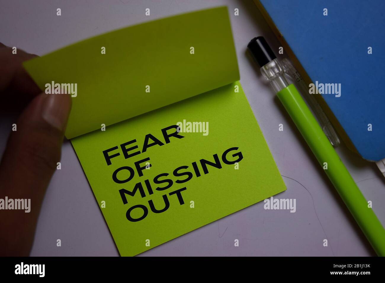 Fear Of Missing Out (FOMO) text on sticky notes isolated on office desk  Stock Photo - Alamy