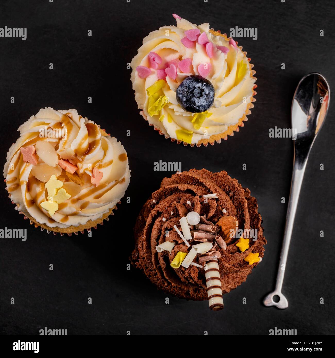 Three different cupcakes top view Stock Photo