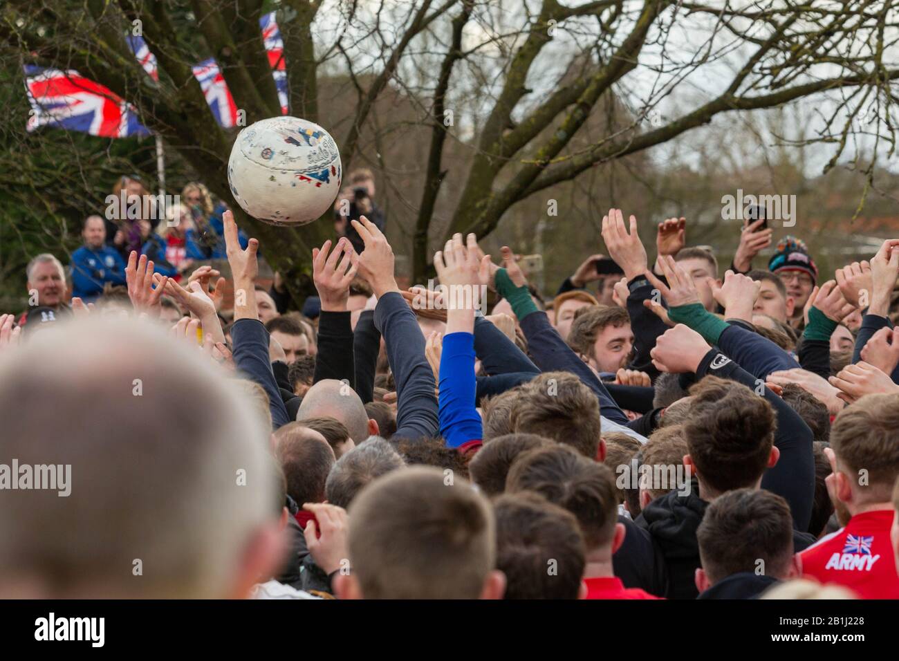 Ashbourne, UK. 25th Feb, 2020. The first day of the two day Shrovetide Football Game in the market town of Ashbourne, Derbyshire. The game is played with two teams, the Up'Ards and the Down'Ards. There are two goal posts 3 miles (4.8 km) apart, one at Sturston Mill (where the Up'Ards attempt to score), other at Clifton Mill (where the Down'Ards score). Penelope Barritt/Alamy Live News Stock Photo