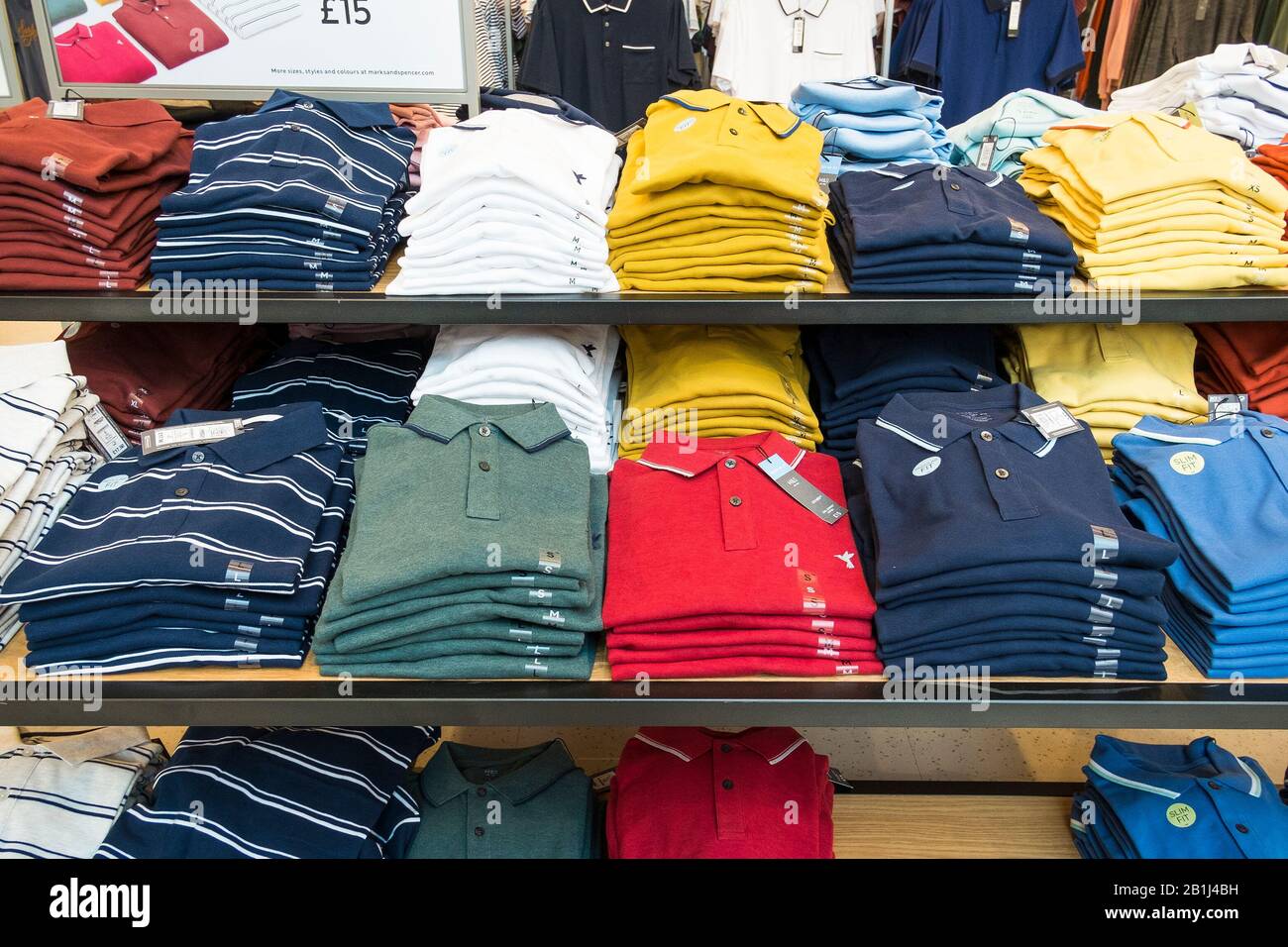 Mens shirts on display in shop hi-res stock photography and images - Alamy