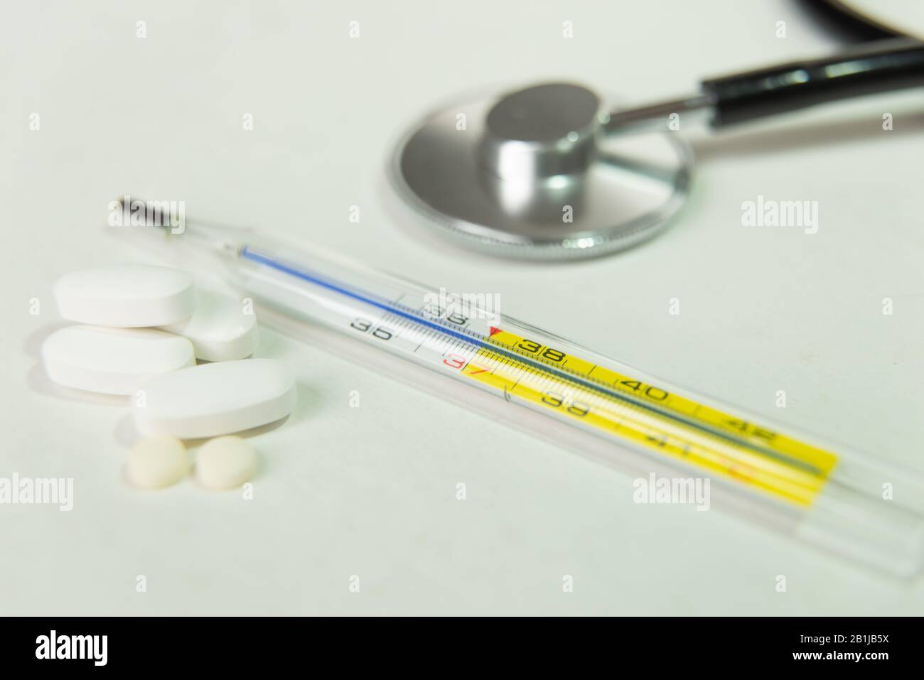 Thermometer and tablets for healthcare Stock Photo