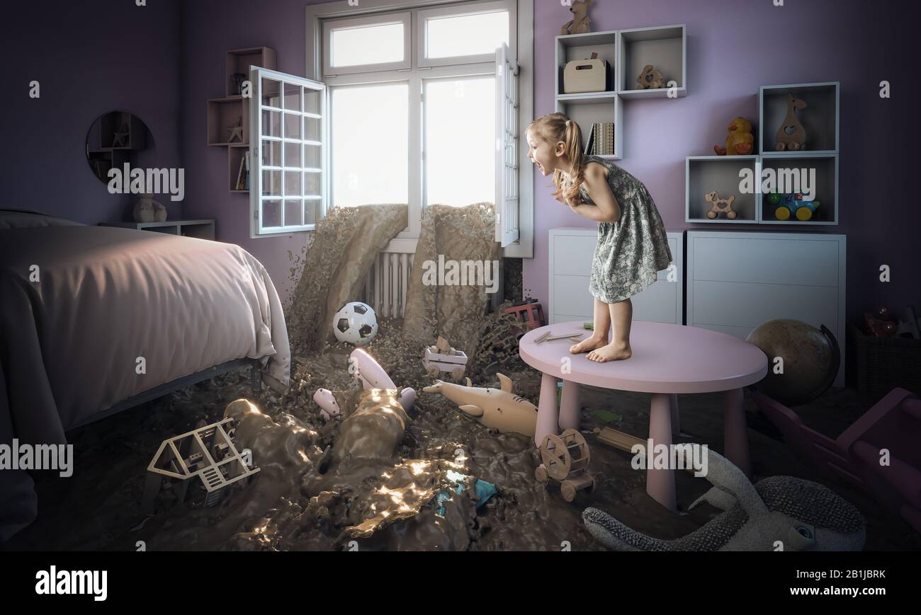 3-year-old Caucasian blond girl frightened and standing on a small table sees mud entering her bedroom. concept of disaster and family problem. Stock Photo