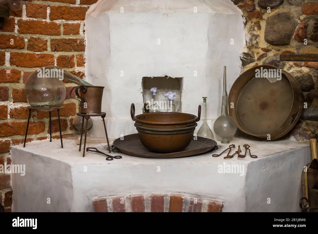 Old alchemy workshop with many equipment Stock Photo
