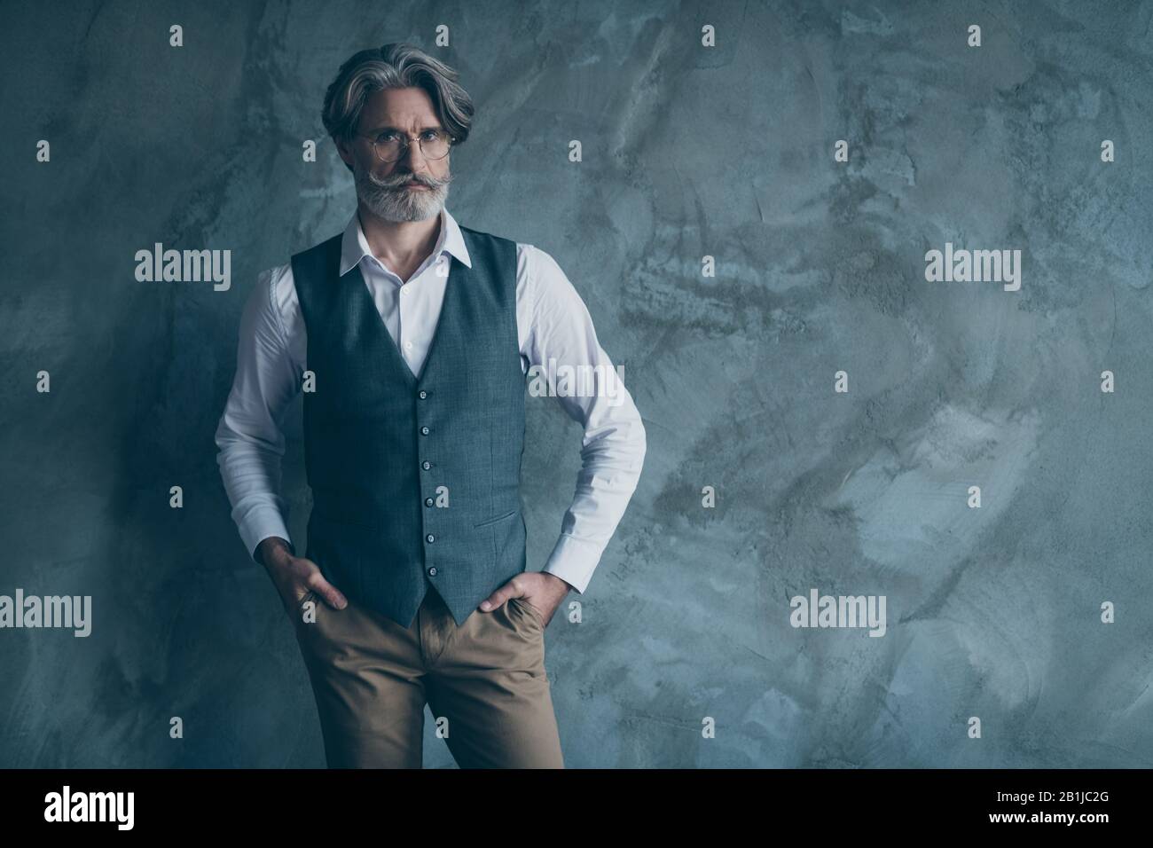 Portrait of gorgeous charismatic rich wealthy old man look good put