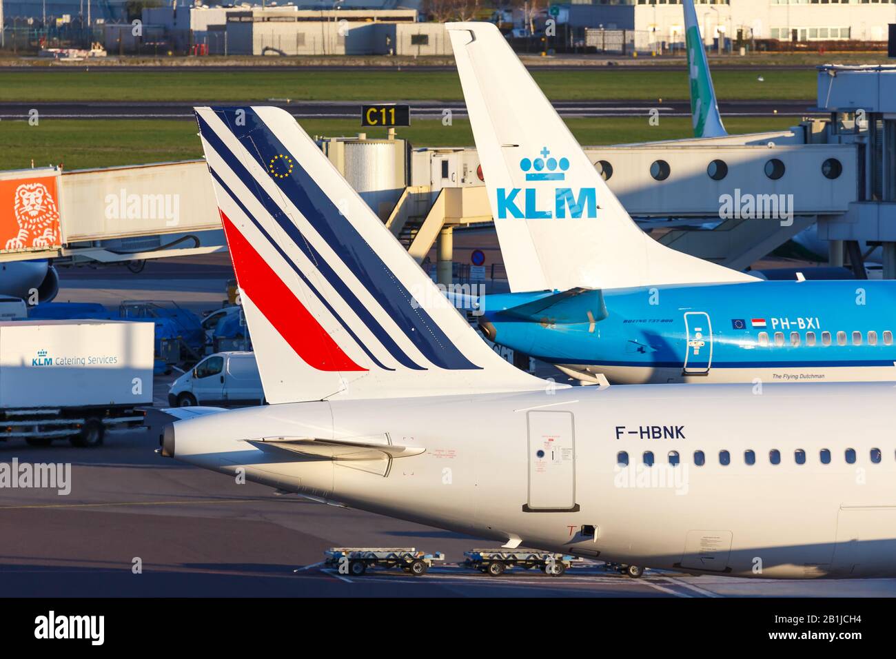 Amsterdam, Netherlands – April 19, 2015: KLM Royal Dutch Airlines and Air France airplanes at Amsterdam Schiphol Airport (AMS) in the Netherlands. Stock Photo