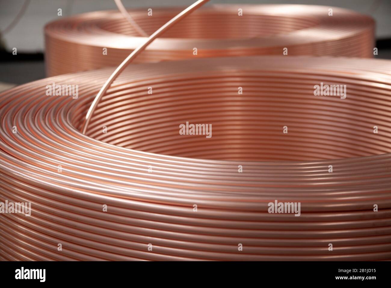 new copper pipes at the factory Stock Photo Alamy