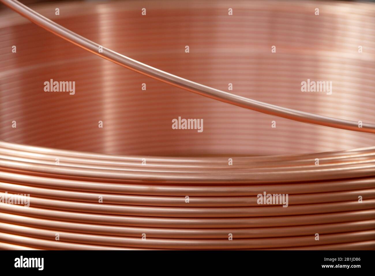 new copper pipes at the factory Stock Photo Alamy