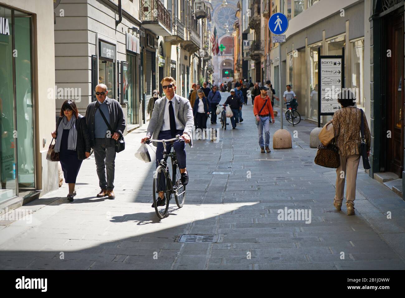 The car-free historic centre of Piacenza, with many bicycles and pedestrians. Piacenza, Italy - april 2019 Stock Photo