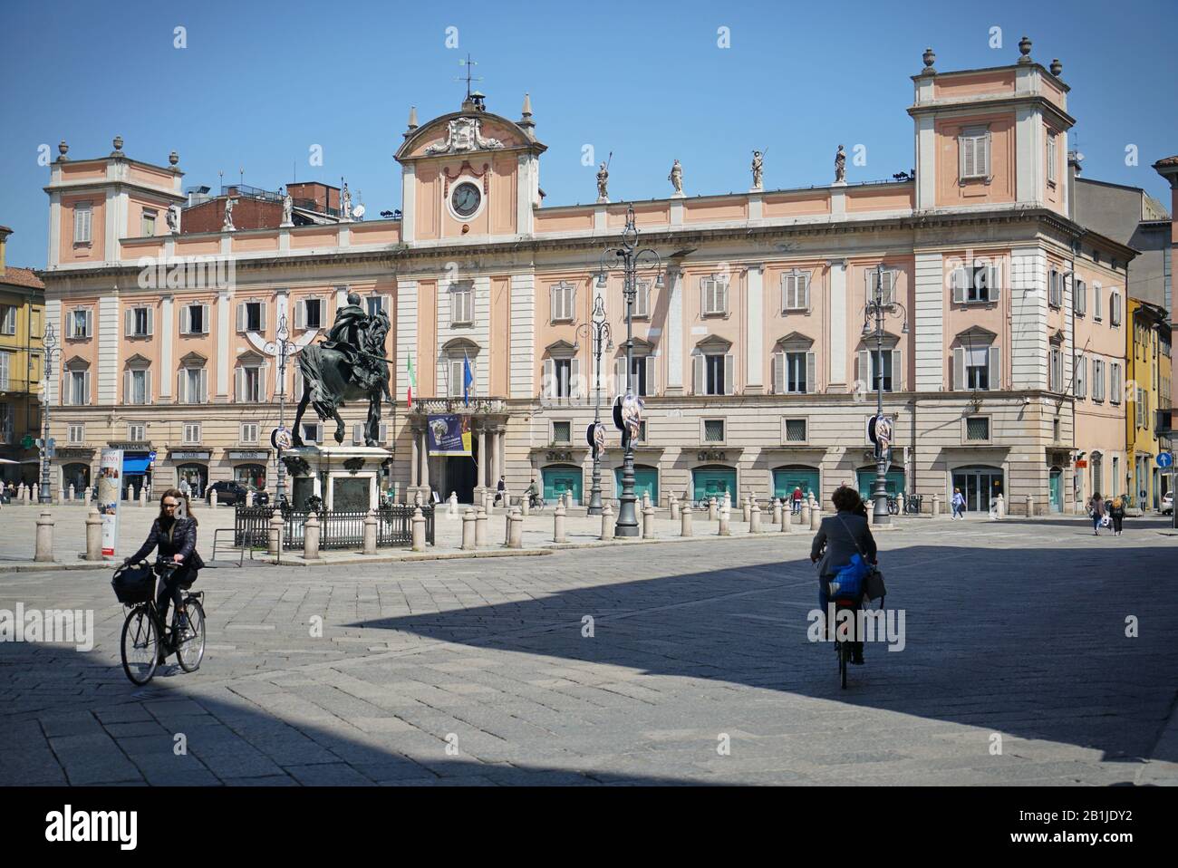 The car-free historic centre of Piacenza, with many bicycles and pedestrians. Piacenza, Italy - april 2019 Stock Photo