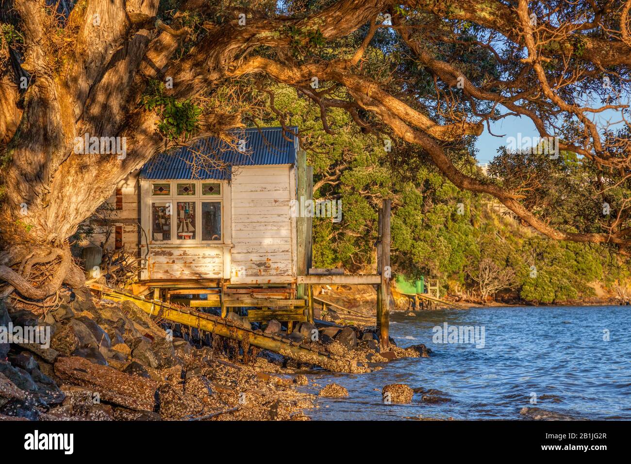 An old wooden boathouse at Northcote Point in Auckland, New Zealand ...