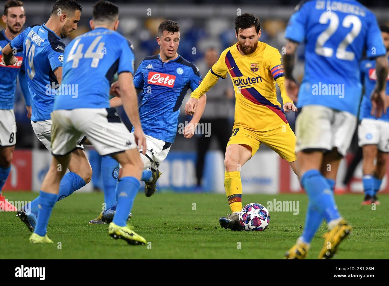Napoli, Italy. 25th Feb, 2020. Lionel Messi of FC Barcelona surrounded Diego Demme and other Napoli players Napoli 25-02-2020 Stadio San Paolo Football Champions League 2019/2020 Round 16, 1st leg