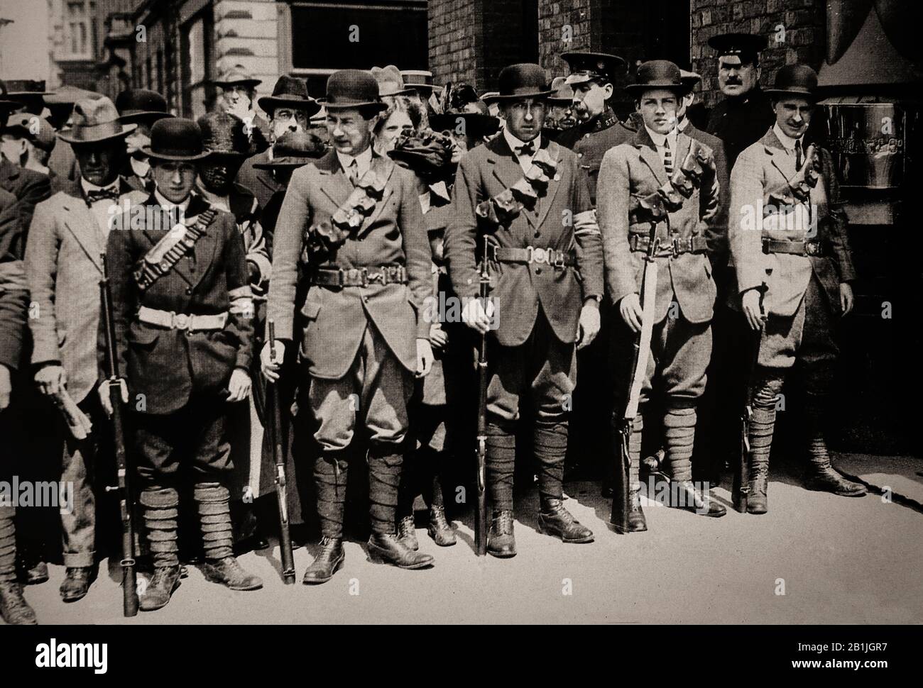 Members of the Ulster Volunteer Force, with German rifles smuggled into Ireland in 1914.  A Unionist militia was founded in 1912 to block Home Rule for Ireland, which was then part of the United Kingdom. The Ulster Volunteers were based in the northern province of Ulster, where they eared being governed by a Catholic-majority parliament in Dublin and losing their local governance and strong links with Great Britain. In 1913, the militias were organised into the Ulster Volunteer Force (UVF) and vowed to resist any attempts by the British Government to impose Home Rule on Ulster. Stock Photo