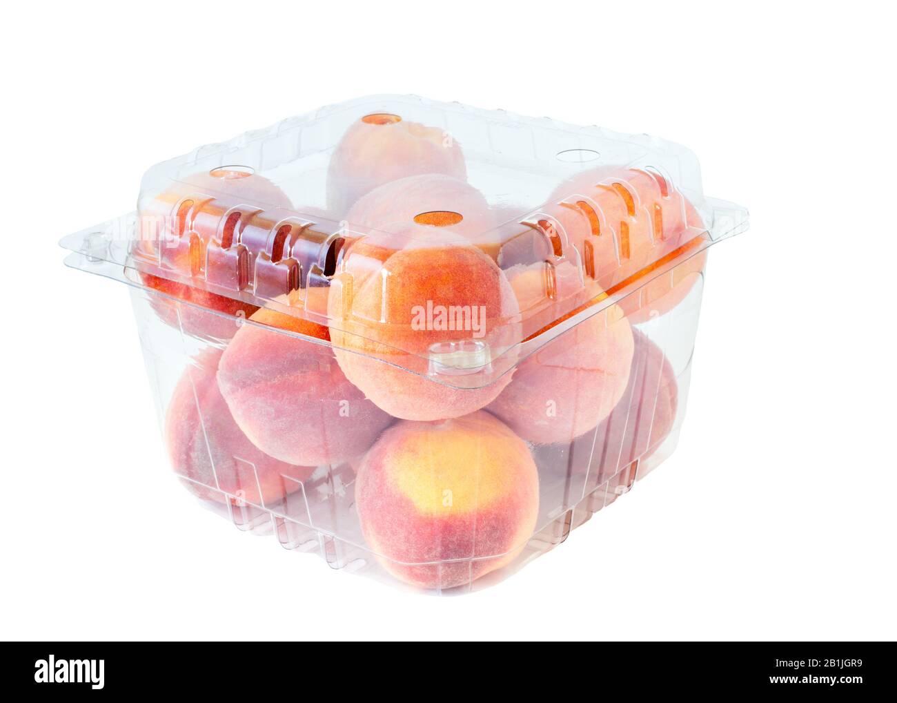 Peaches for sale in clear plastic cellophane boxes. Stock Photo