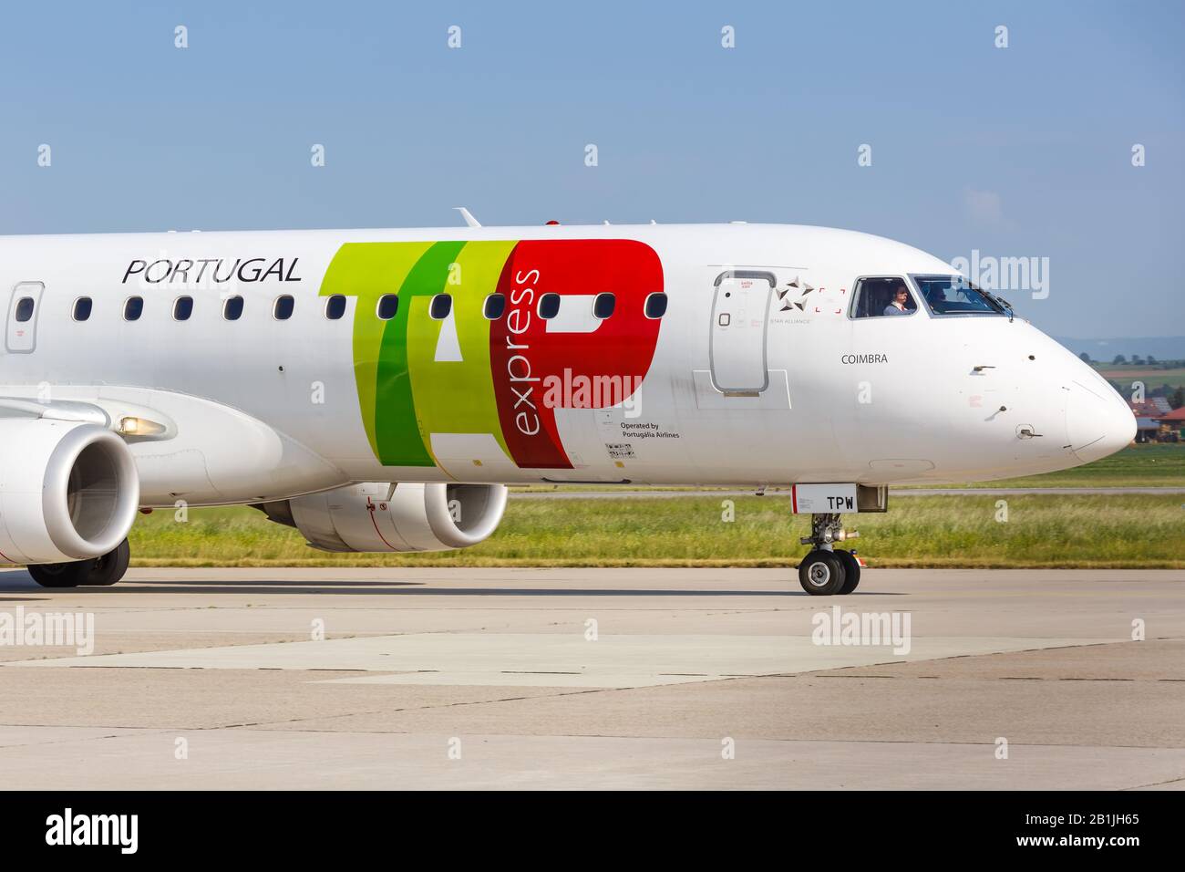 Stuttgart, Germany – May 18, 2018: TAP Portugal Express Embraer 190 airplane at Stuttgart airport (STR) in Germany. Stock Photo
