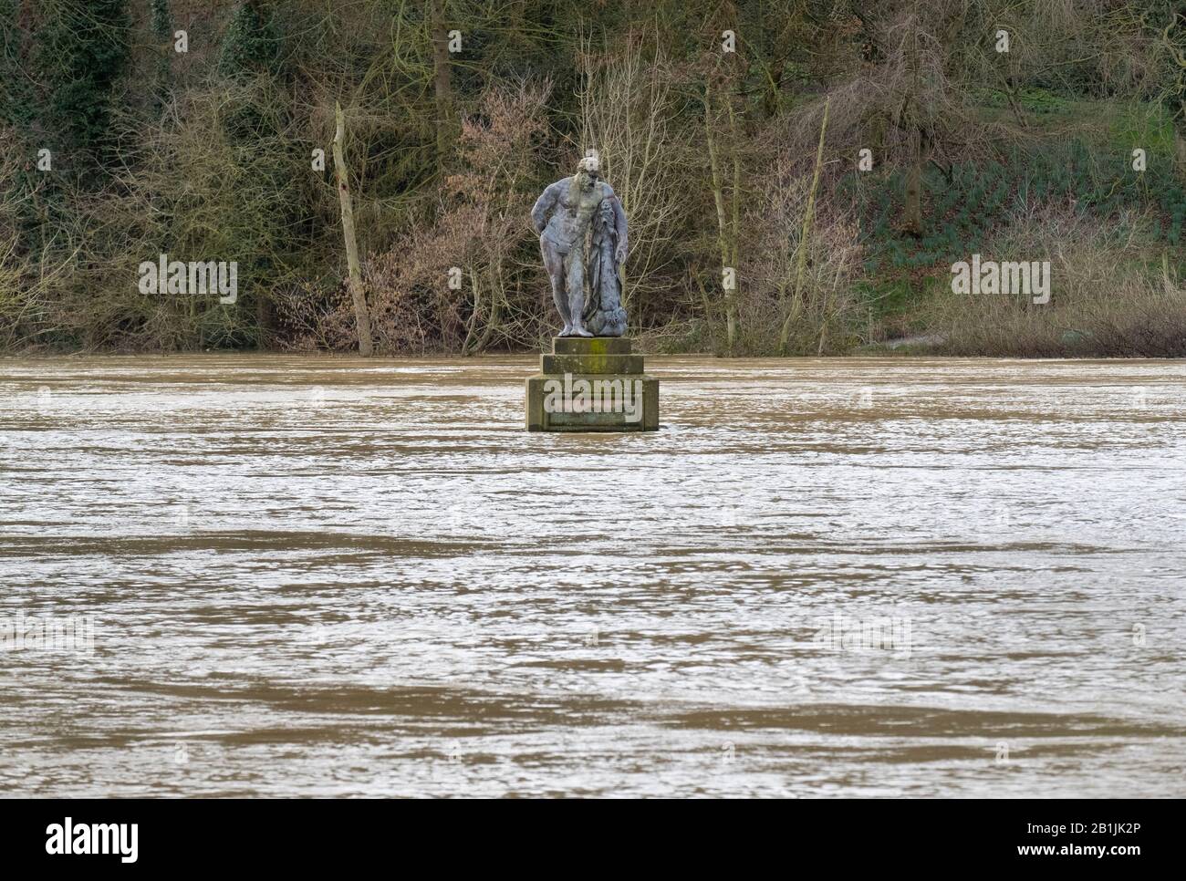 Statue of Hercules surrounded by River Severn floodwater in the Quarry ...