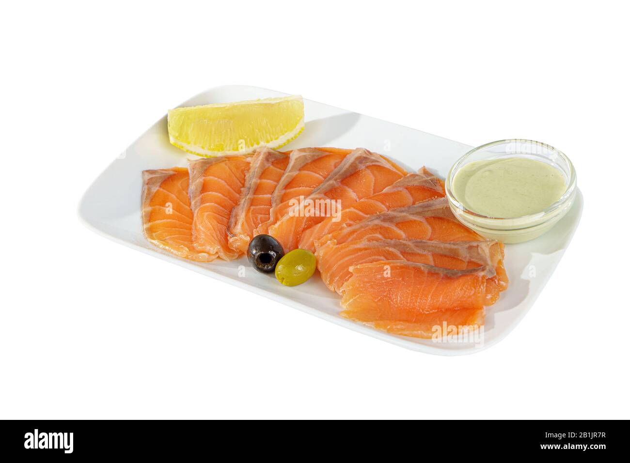 Cold appetizer before alcohol, salmon fillet salted with sauce wasabi