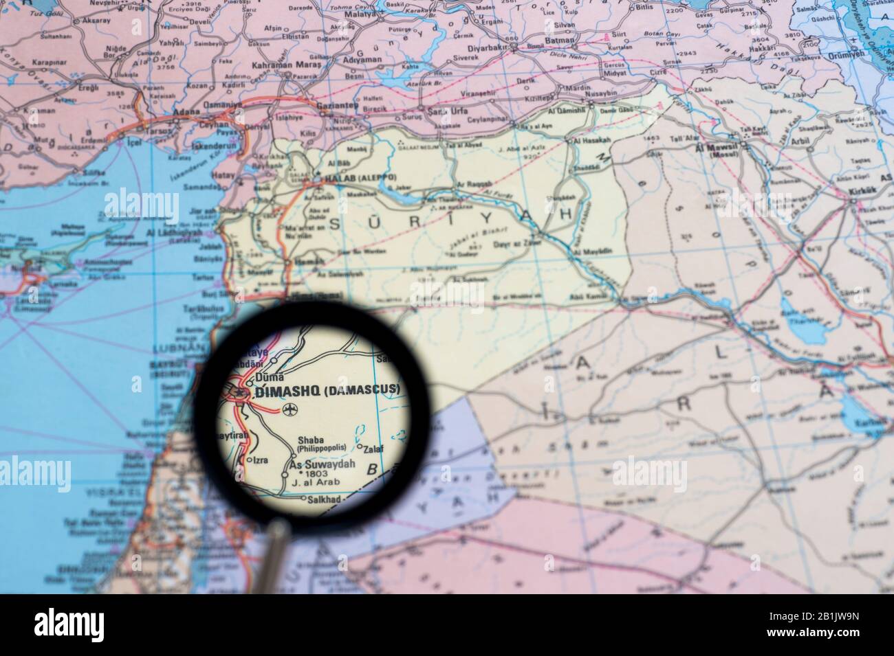 The capital of Syria, Damascus, through a magnifying glass on the