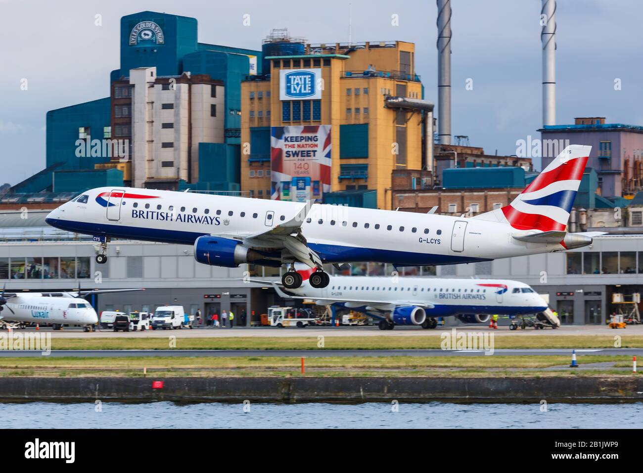 London, United Kingdom – July 7, 2019: British Airways BA CityFlyer Embraer 190 airplane at London City airport (LCY) in the United Kingdom. Stock Photo