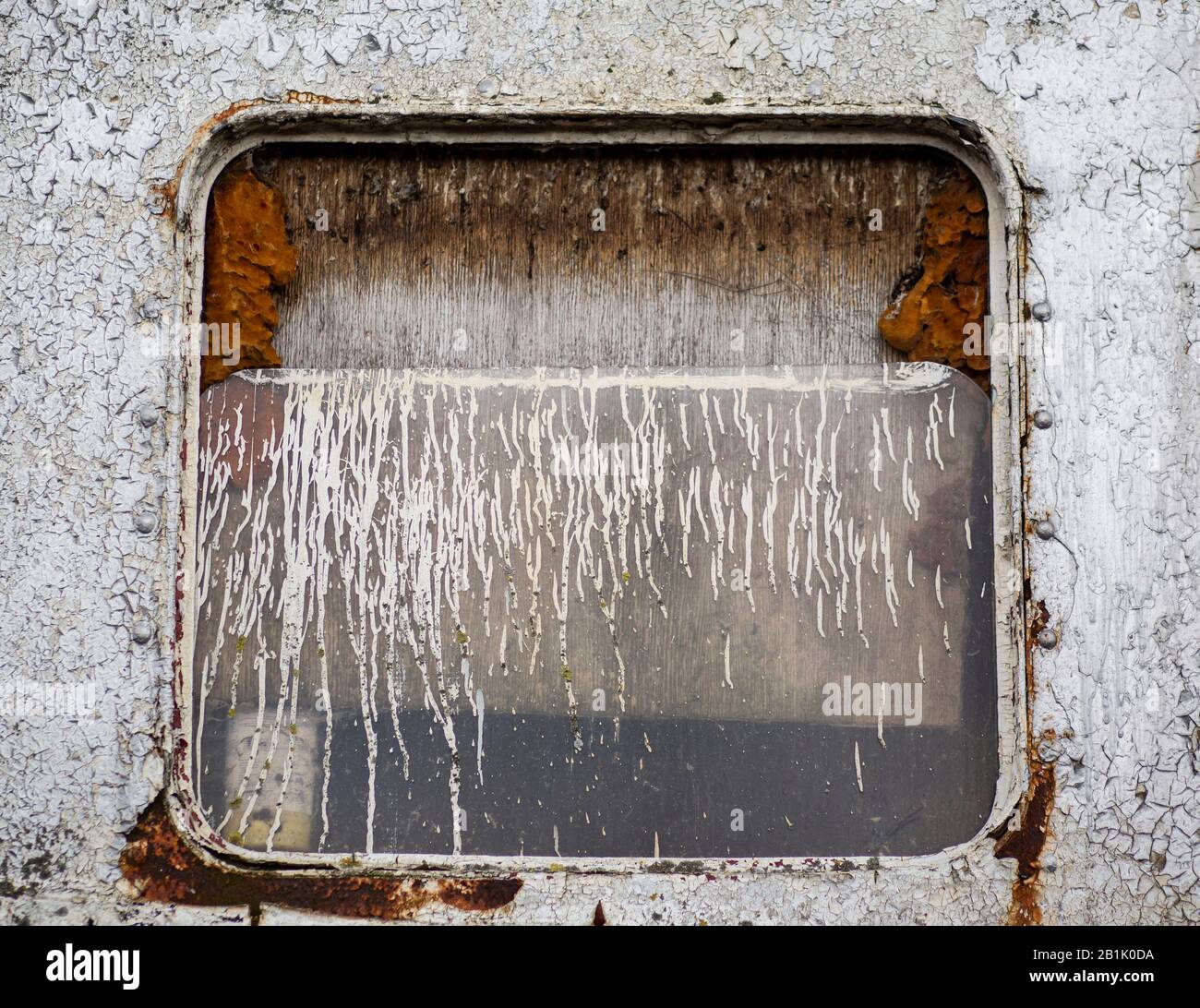Broken window on derelict Royal Iris ferry boat Stock Photo