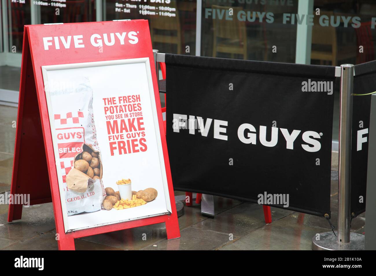Five guys seating outside hires stock photography and images Alamy