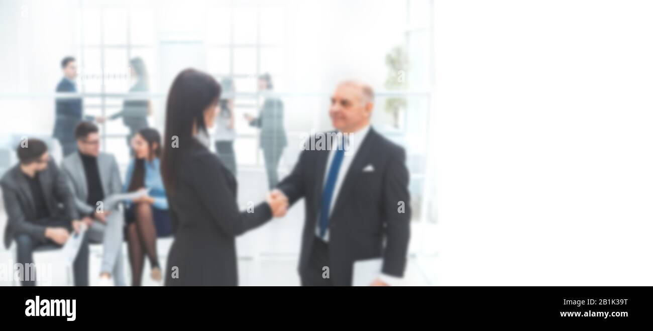 boss and the assistant discuss a business document. background in blur Stock Photo