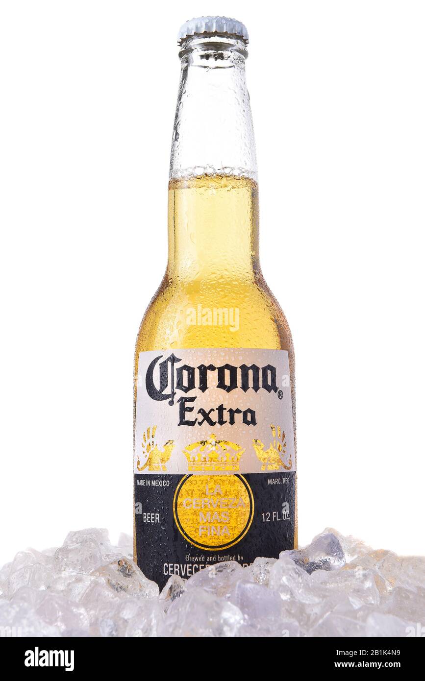 IRVINE, CALIFORNIA - MARCH 12, 2018: A bottle of Corona Extra Beer in ice. Corona is the most popular imported beer in the USA. Stock Photo