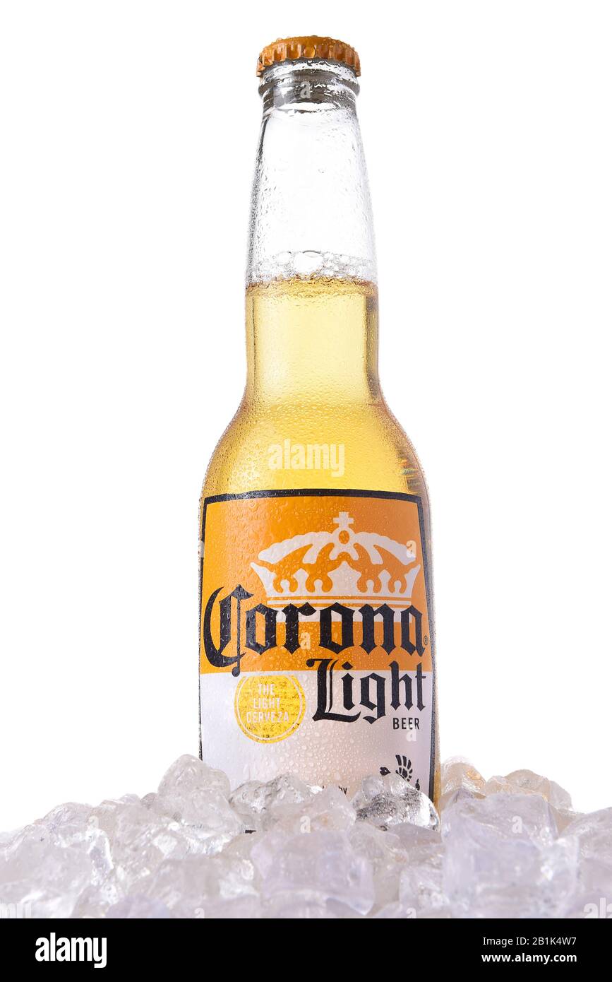 IRVINE, CALIFORNIA - MARCH 12, 2018: A bottle of Corona Light Beer in ice. Corona is the most popular imported beer in the USA. Stock Photo