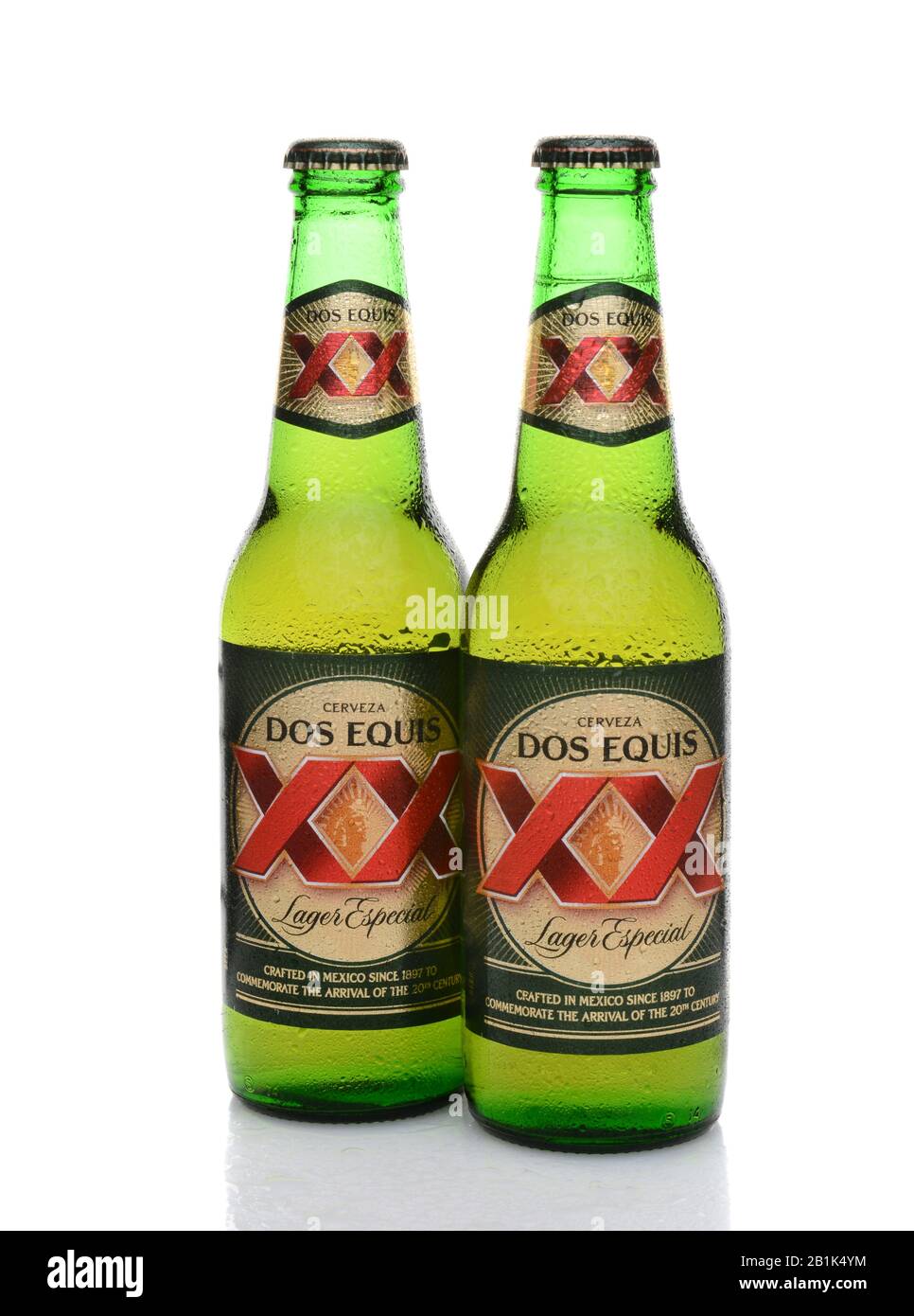 IRVINE, CA - MAY 25, 2014: Two Bottles of Dos Equis Lager Especial with condensation. Founded in 1890 from the Cuauhtemoc-Moctezuma Brewery in Monterr Stock Photo