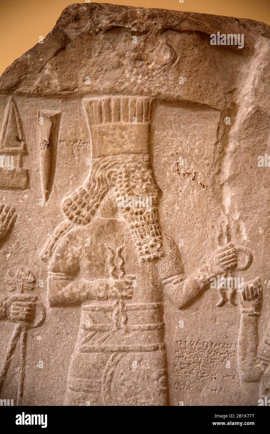 Stele. 8th BCE. Shamsh-res-usur, governor of Mari and Suhi attitude of prayer in front of the gods. Iraq. Stock Photo