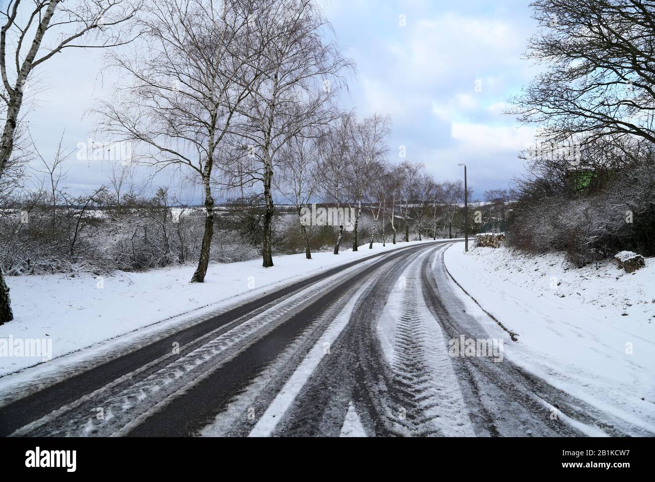 Streets and roads covered with white snow Stock Photo - Alamy