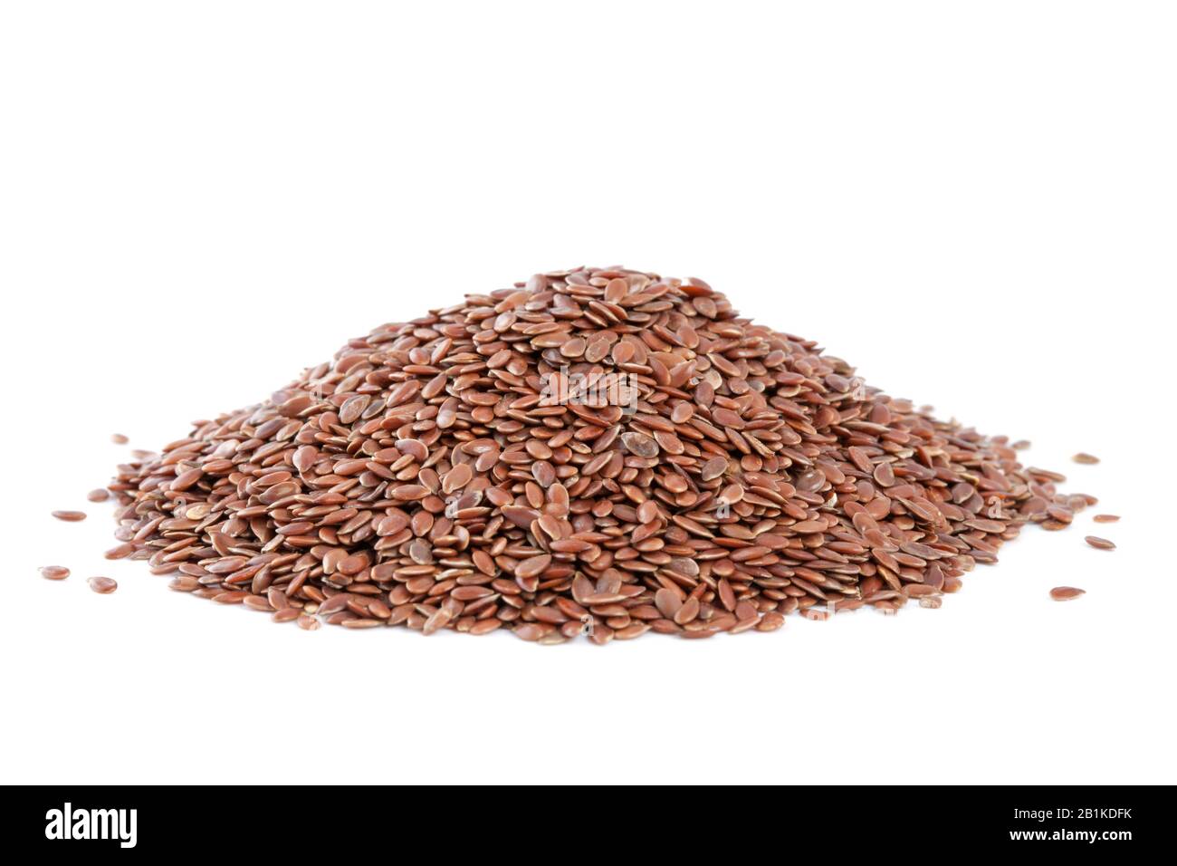 Heap Flax seeds (Linum usitatissimum) isolated on white background. Also called common flax or linseed. Used as an ingredient in paints, fiber and cat Stock Photo