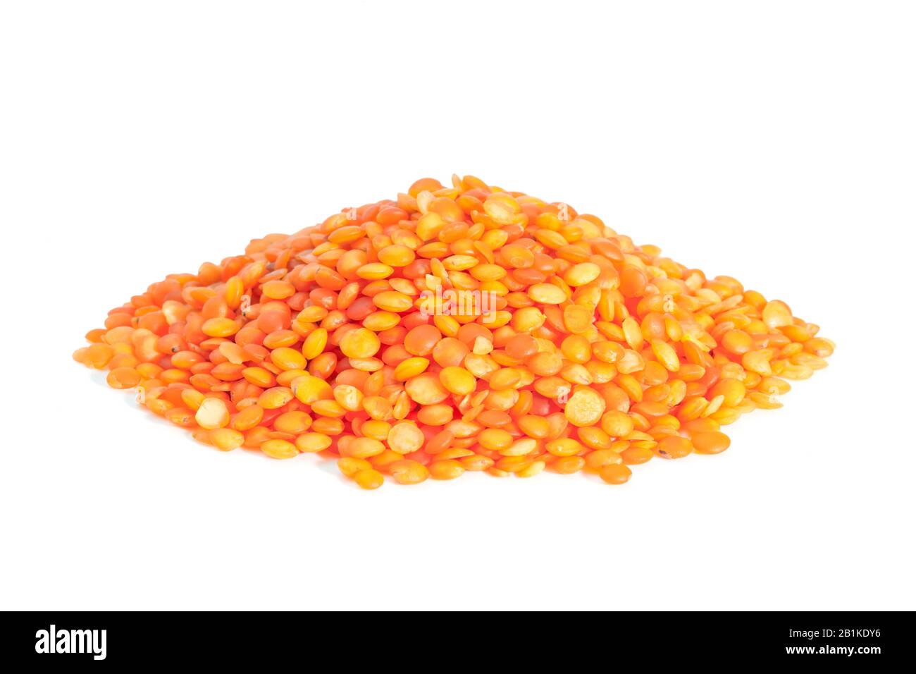 Pile Red lentils isolated on white background. Lentils are rich in
