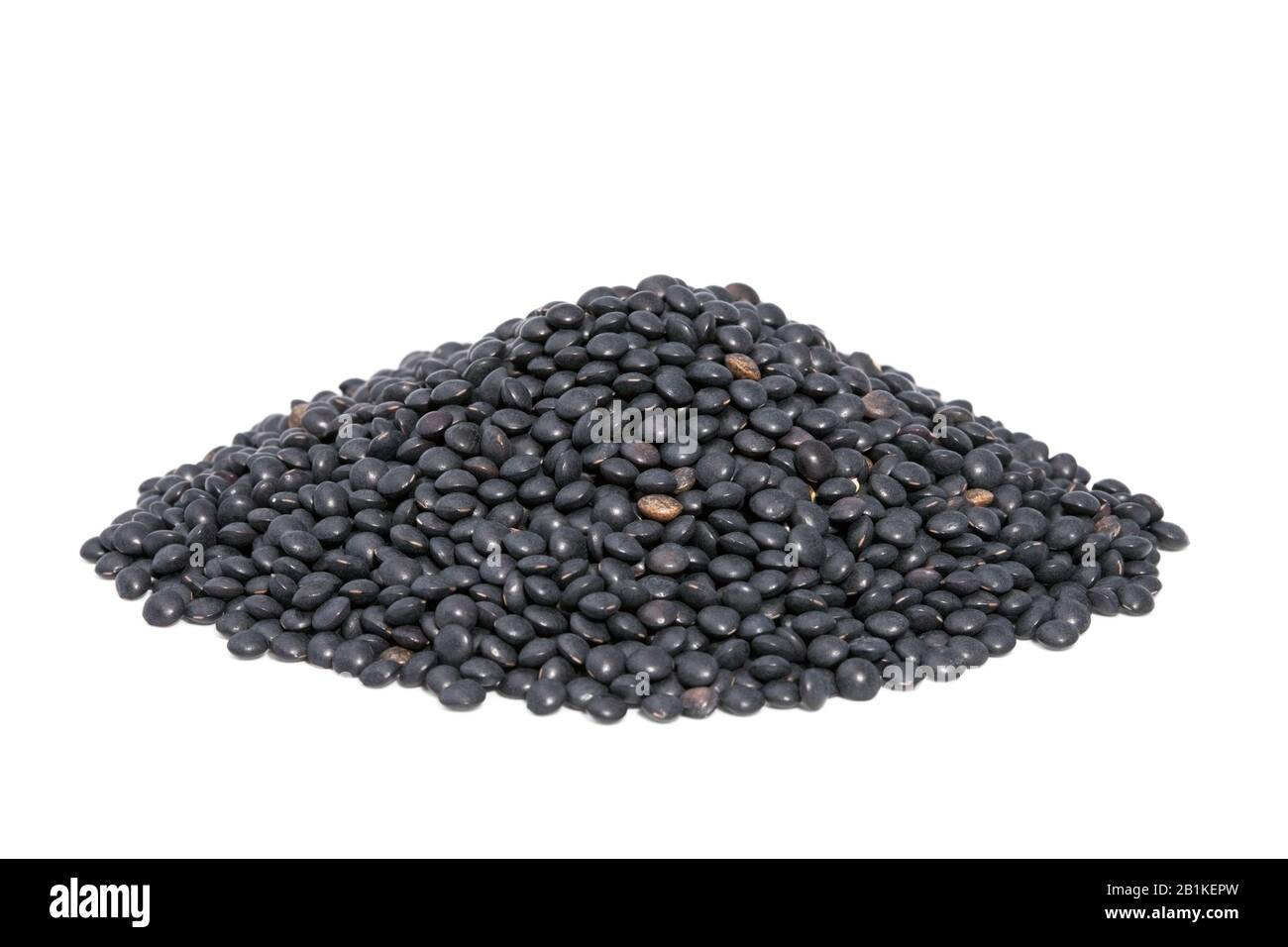 Pile Black Beluga Lentils isolated on white background. Lentils are rich in protein
