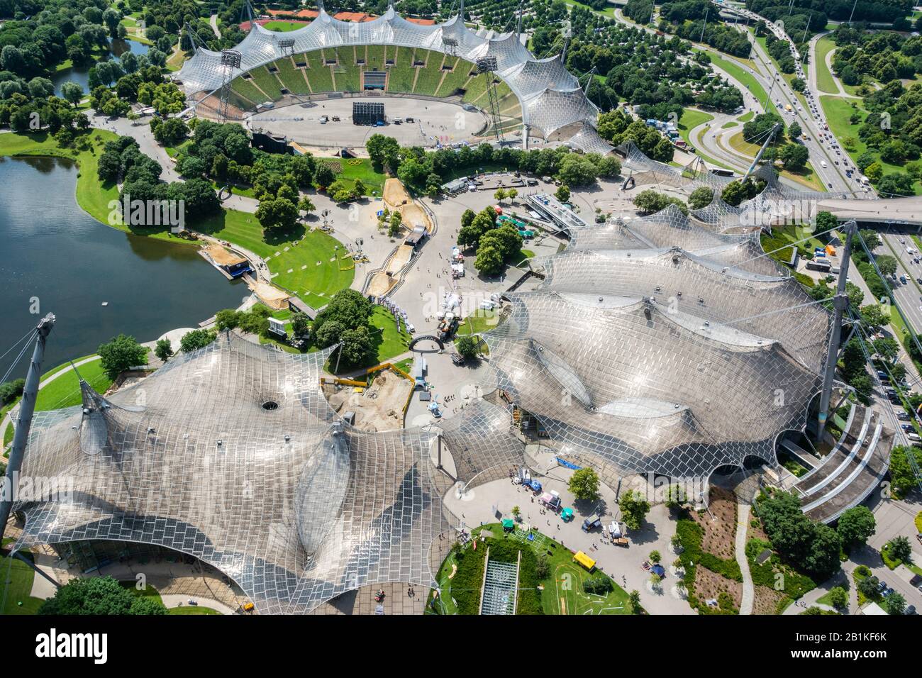 Munich, Germany – July 1, 2016. View over Olympiastadion stadium, Olympiahalle arena and Olympia Schwimmhalle aquatics centre in Munich. Stock Photo