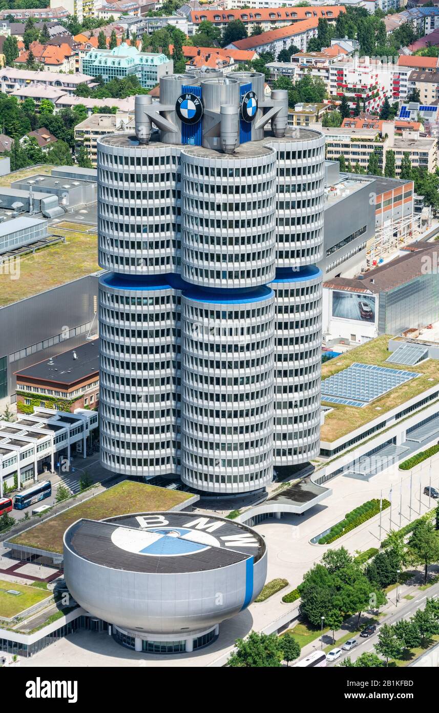 Munich, Germany – July 1, 2016. Aerial view over the BMW Headquarters building and BMW Museum in Munich. Both buildings were designed by the Austrian Stock Photo