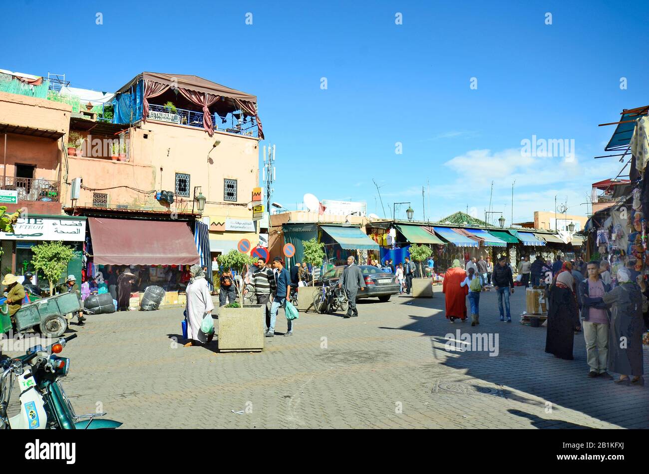Marrakesh, Morocco - November 22nd 2014: Unidentified people and shops in the souk in old precinct named Medina Stock Photo