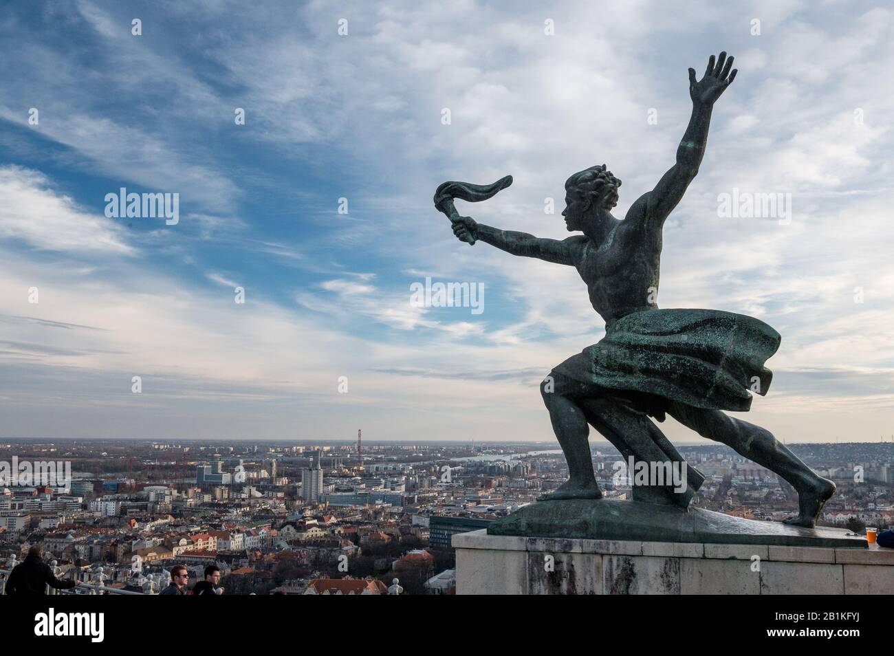 flame of freedom statue on Gellert Hill with view over Budapest on a beautiful winter day Stock Photo