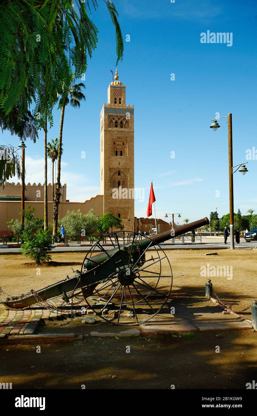 Marrakesh, Morocco - November 23rd 2014: Unidentified people and Koutoubia mosque, a landmark in the city near Djemaa el Fna square Stock Photo