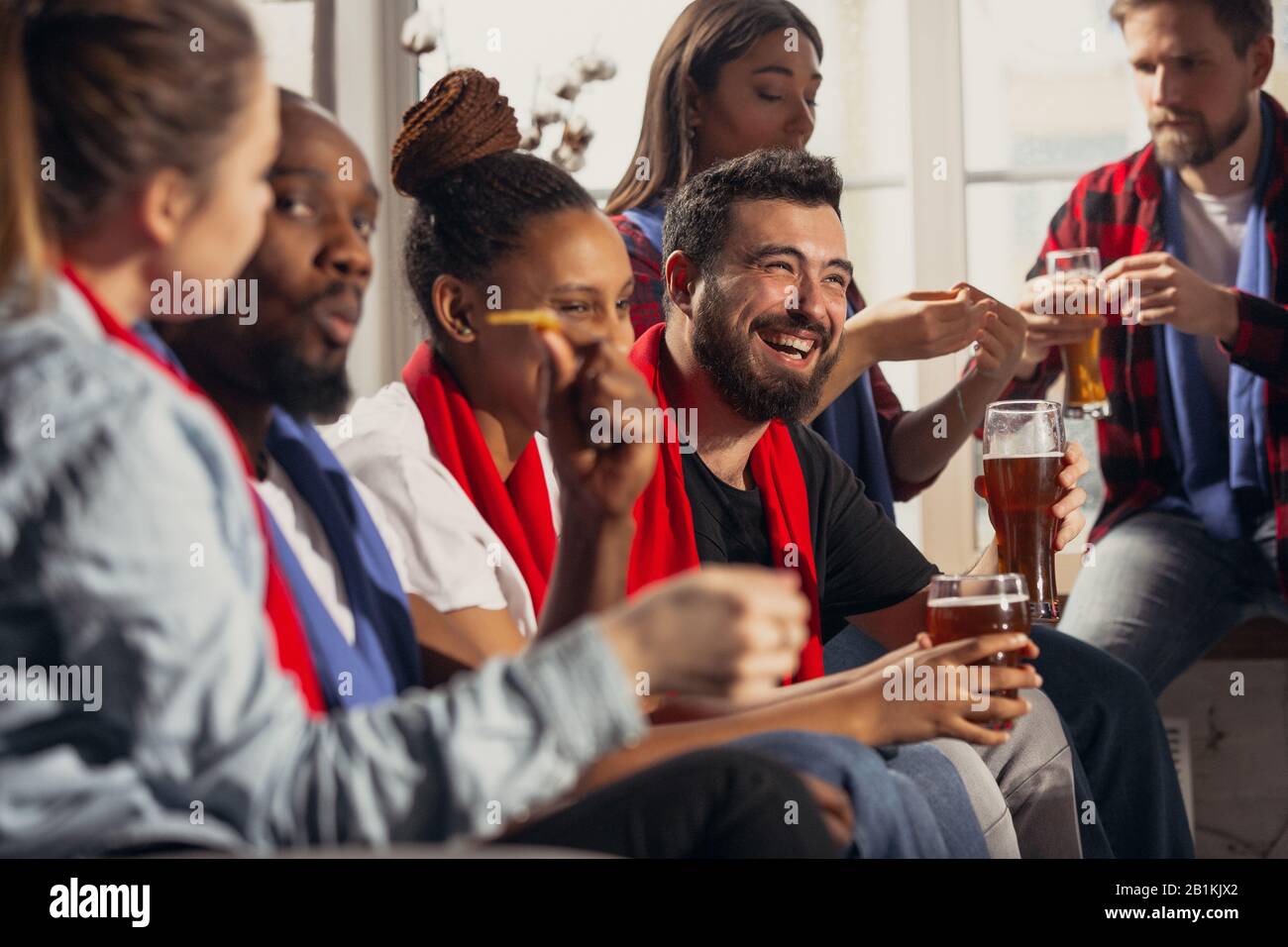 Excited Group Of People Watching Football Sport Match At Home Multiethnic Group Of Friend Fans Cheering For Favourite National Basketball Tennis Soccer Hockey Team Concept Of Emotions Support Stock Photo Alamy