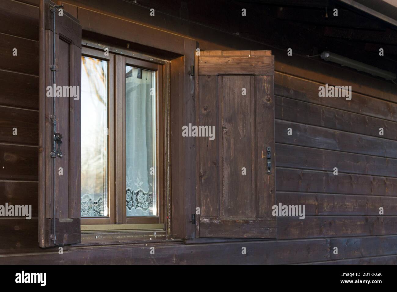 rustic window of a wooden hut Stock Photo