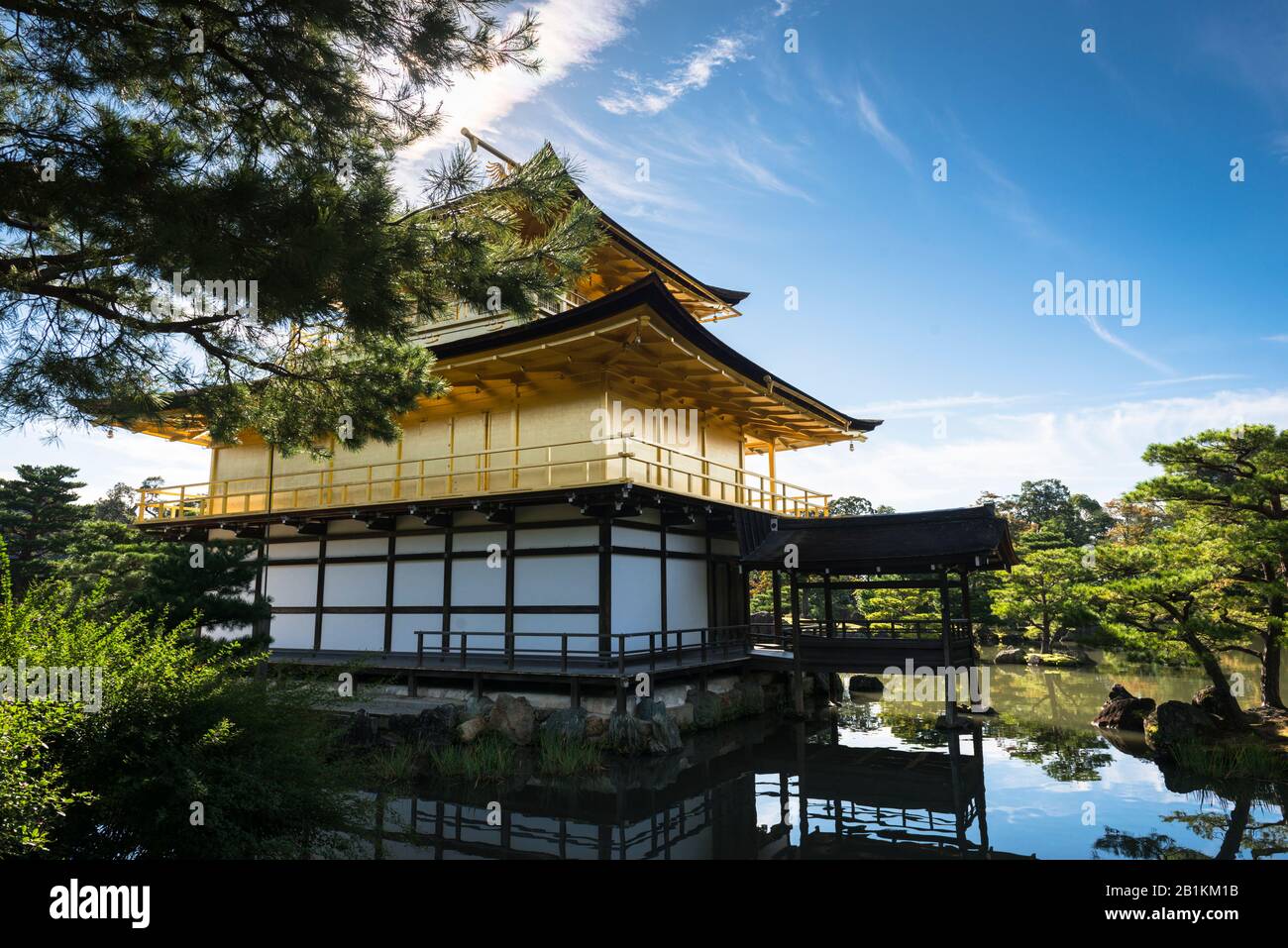 The Zen Buddhist temple, Kinkaku-jo, the Temple of the Golden Pavilion, seemingly floating above Kyoko-chi (Mirror Pond). Kitayama, Kyoto, Japan Stock Photo