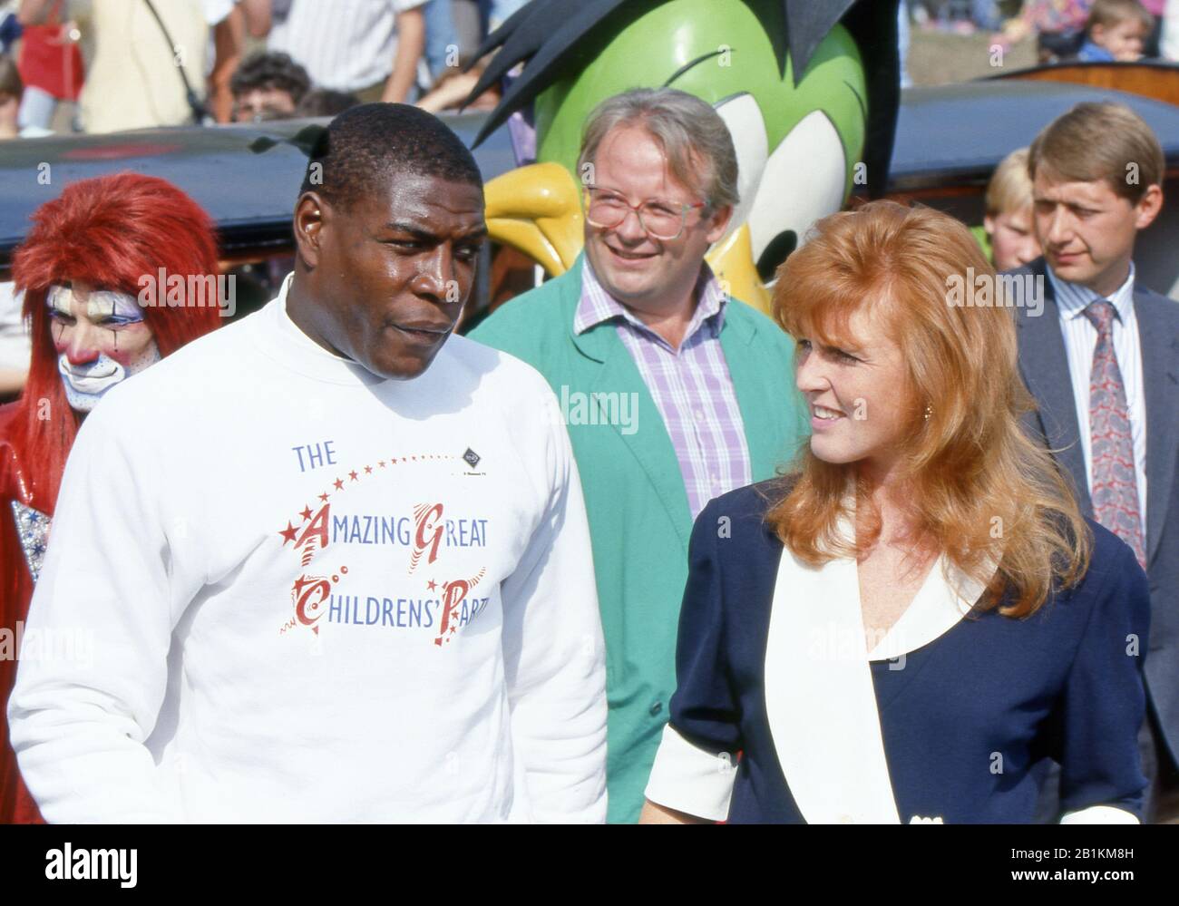 Boxer Frank Bruno, Christopher Biggins and Sarah Ferguson, Duchess of York at a Children's party in Battersea Park, London, England September 1990 Stock Photo