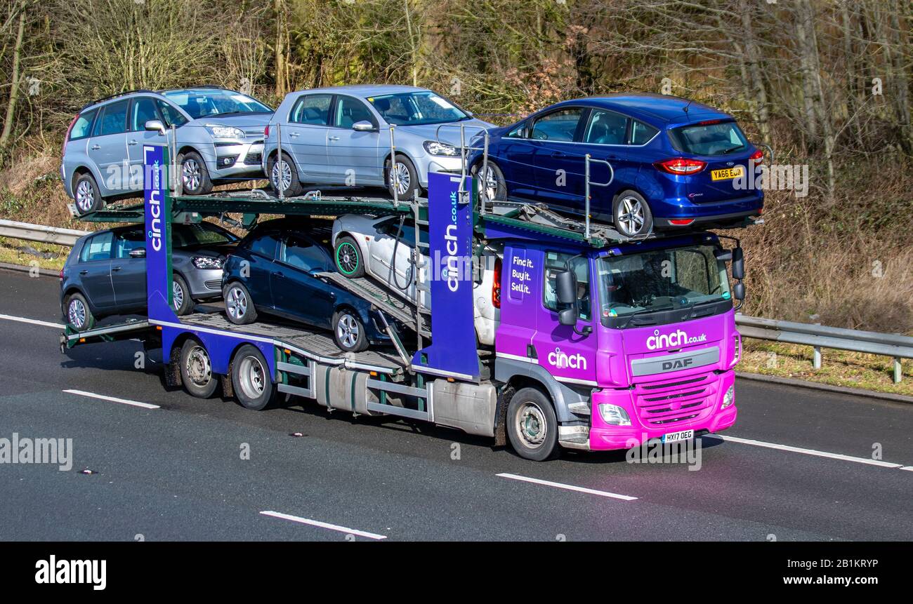 CINCH car transporter carrier; Motorway heavy bulk Haulage delivery trucks, haulage, lorry, transportation,  BCA collection and deliveries, truck, special cargo, DAF vehicle, delivery, transport, industry, second hand cars on the M6 at Lancaster, Stock Photo