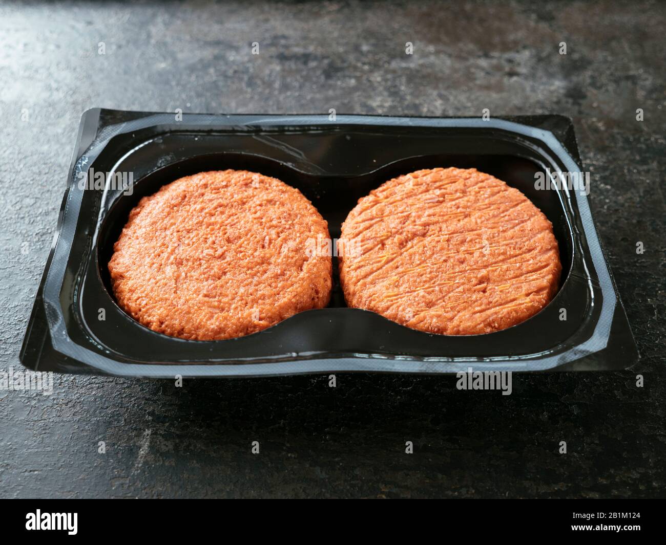 Two soy protein based vegan burgers Stock Photo Alamy