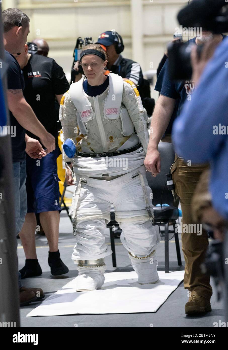 Astronaut Zena Cardman suits up in NASA's Neutral Buoyancy Lab for weightlessness training in the 6.2 million gallon pool containing a mockup of the International Space Station (ISS) in Houston, Texas. Stock Photo