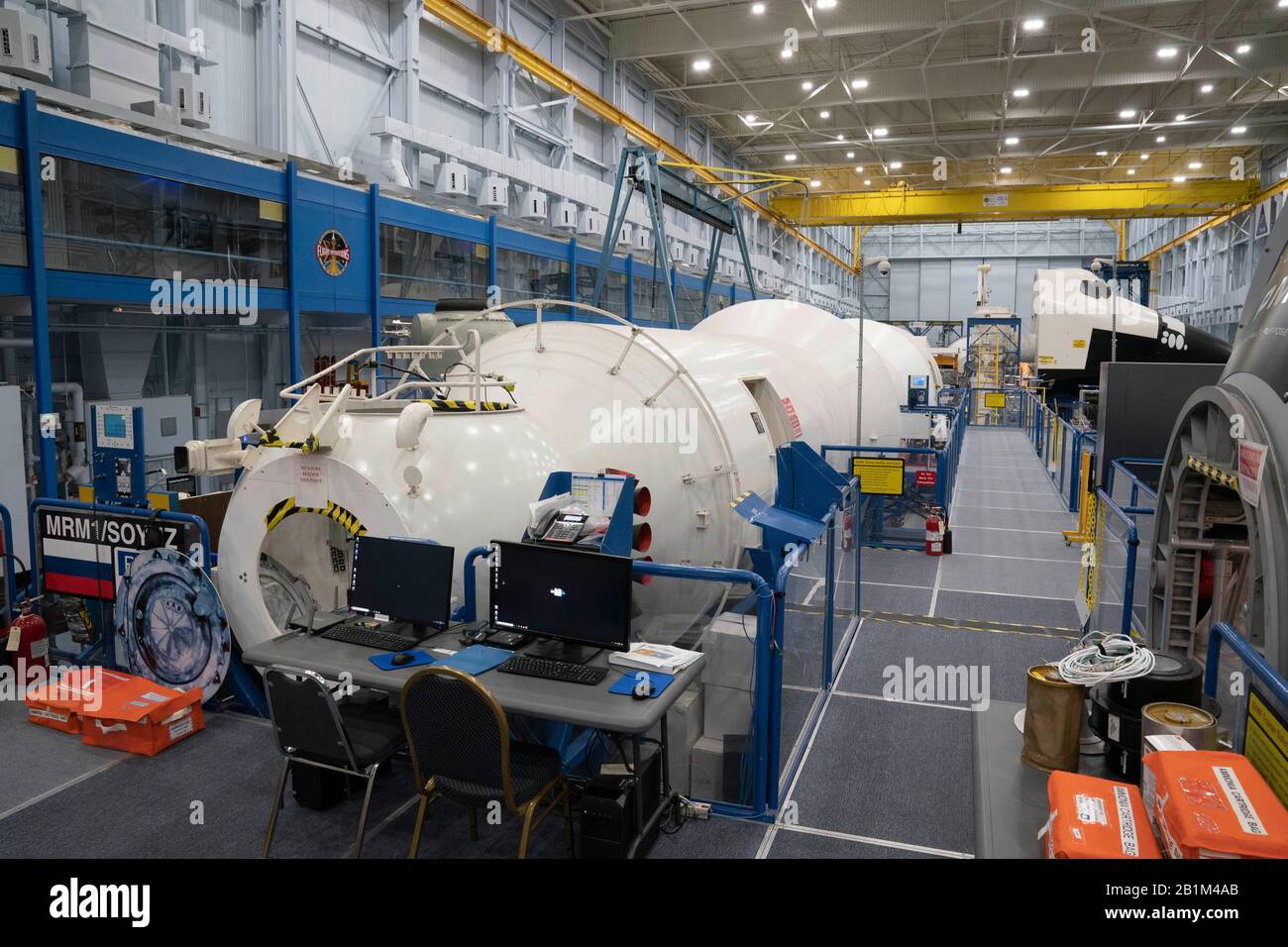 Mockups of various spacecraft including the Soviet portion of the International Space Station (ISS) used for astronaut training at a cavernous NASA Johnson Space Center facility in Houston. Stock Photo